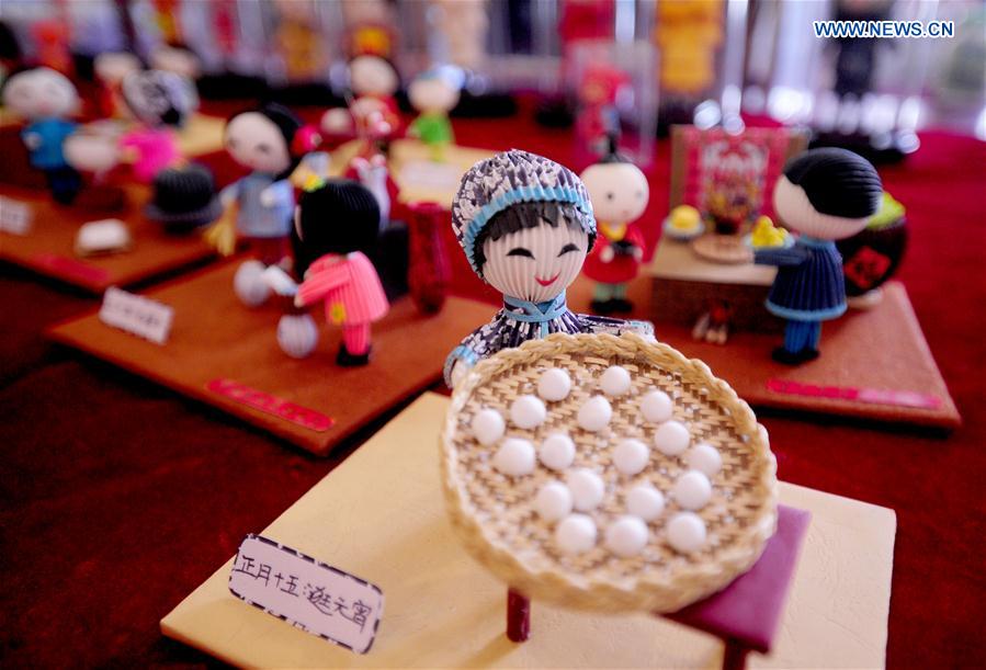 Photo taken on Feb. 18, 2016 shows paper-made handicraft works designed by Li Xue during an intangible cultural heritage show at Liaoning Grand Theater in Shenyang, northeast China's Liaoning Province. 