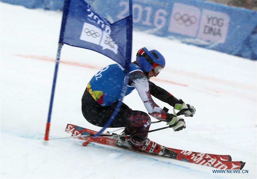 Justin Alkier of Canada competes during the Parallel Mixed Team Event of Alpine Skiing at Lillehammer 2016 Winter Youth Olympic Games in Lillehammer, Norway on Feb. 20, 2016.