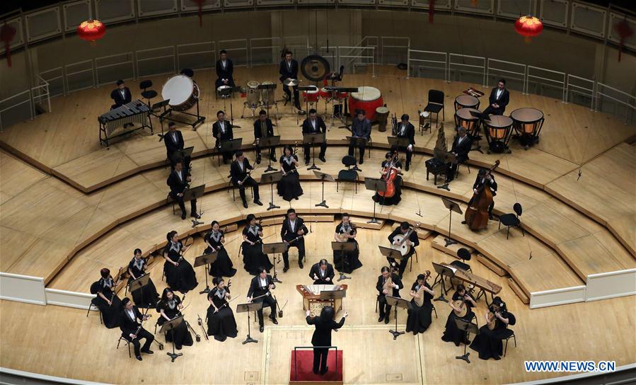 China Radio Nationalities Orchestra performs during a concert at the Symphony Center of Chicago in Chicago, the United States, Feb. 21, 2016. 