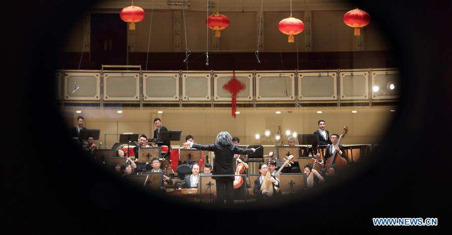 China Radio Nationalities Orchestra performs during a concert at the Symphony Center of Chicago in Chicago, the United States, Feb. 21, 2016.