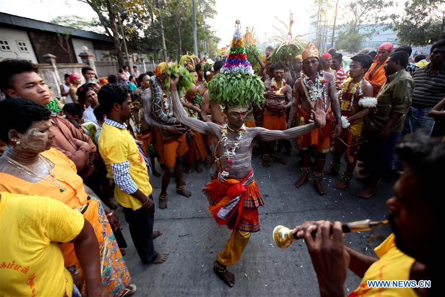 Hindu devotees attend a celebration of a traditional Hindu religious festival in Yangon, Myanmar, Feb. 21, 2016.