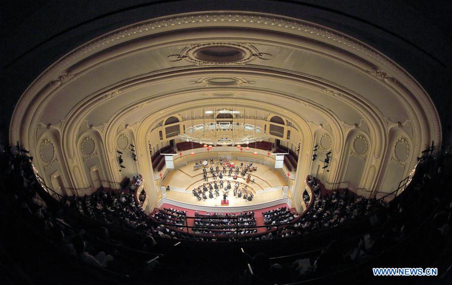 China Radio Nationalities Orchestra performs during a concert at the Symphony Center of Chicago in Chicago, the United States, Feb. 21, 2016. 