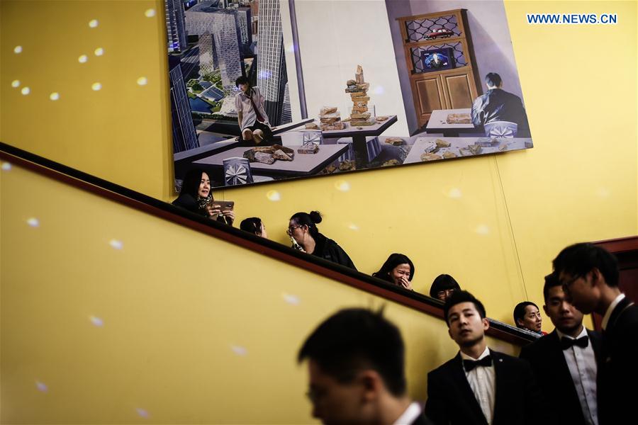 Guests gather at the Kino Babylon prior to the opening ceremony of the 1st Berlin Chinese Film Festival at the Kino Babylon in Berlin, Germany, on Feb. 24, 2016.