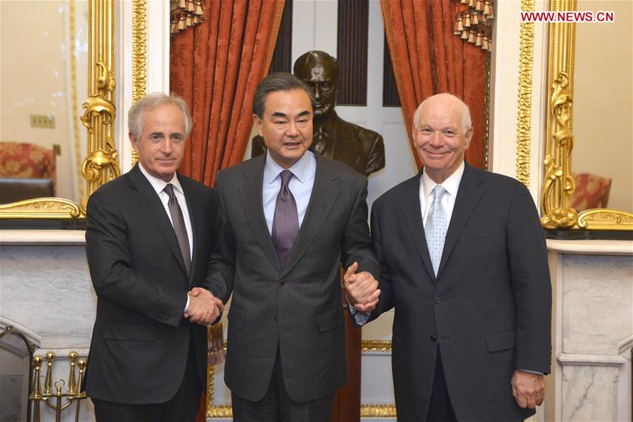 WASHINGTON D.C., Feb. 25, 2016 (Xinhua) -- Chinese Foreign Minister Wang Yi (C) meets with Bob Corker (L), chairman of U.S. Senate Foreign Relations Committee, and ranking member Ben Cardin in Washington D.C., the United States, Feb. 24, 2016. (Xinhua/Yin Bogu) 