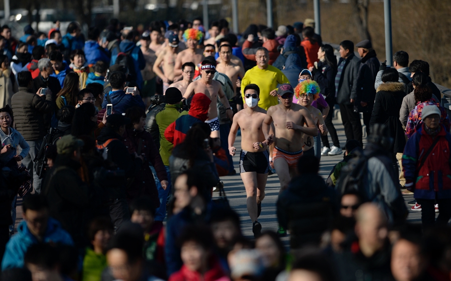 Runners at Beijing's 'naked run' race