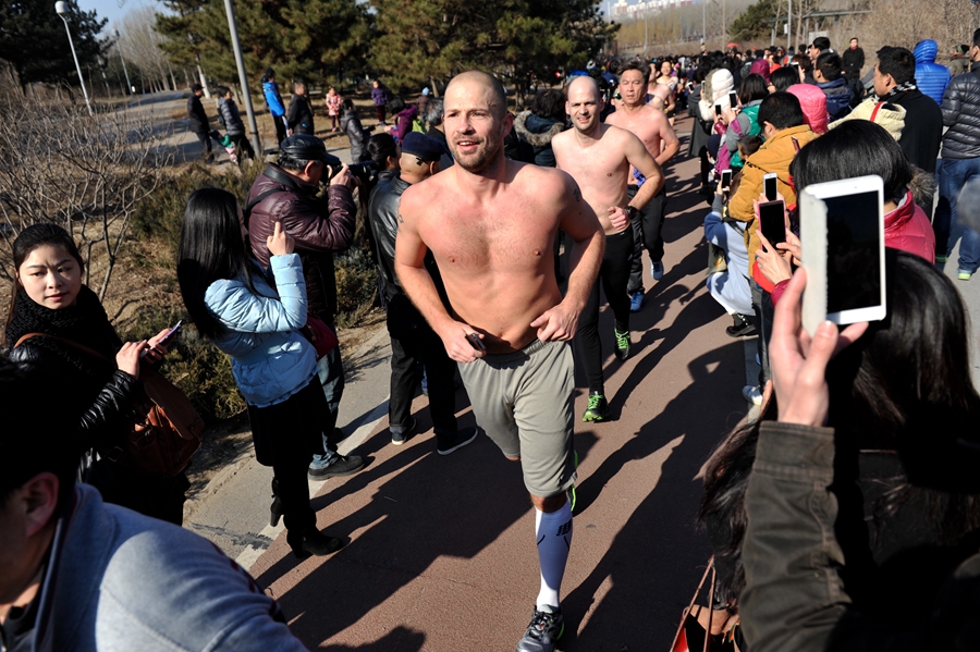 Runners at Beijing's 'naked run' race