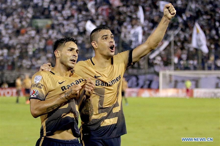 Image taken for Club Universidad Nacional A.C. (PUMAS) shows UNAM's Pumas Ismael Sosa (L) celebrating after scoring with his teammate Gerardo Alcoba during the match of Group 7 of Copa Libertadores against Olimpia of Paraguay, at Manuel Ferreira Stadium in Asuncion, capital of Paraguay, on March 1, 2016.