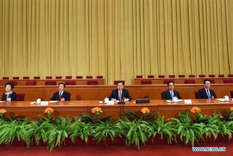 Zhang Dejiang (C), chairman of the Standing Committee of China's National People's Congress (NPC), presides over a preparatory meeting for the fourth session of the 12th NPC at the Great Hall of the People in Beijing, capital of China, March 4, 2016.