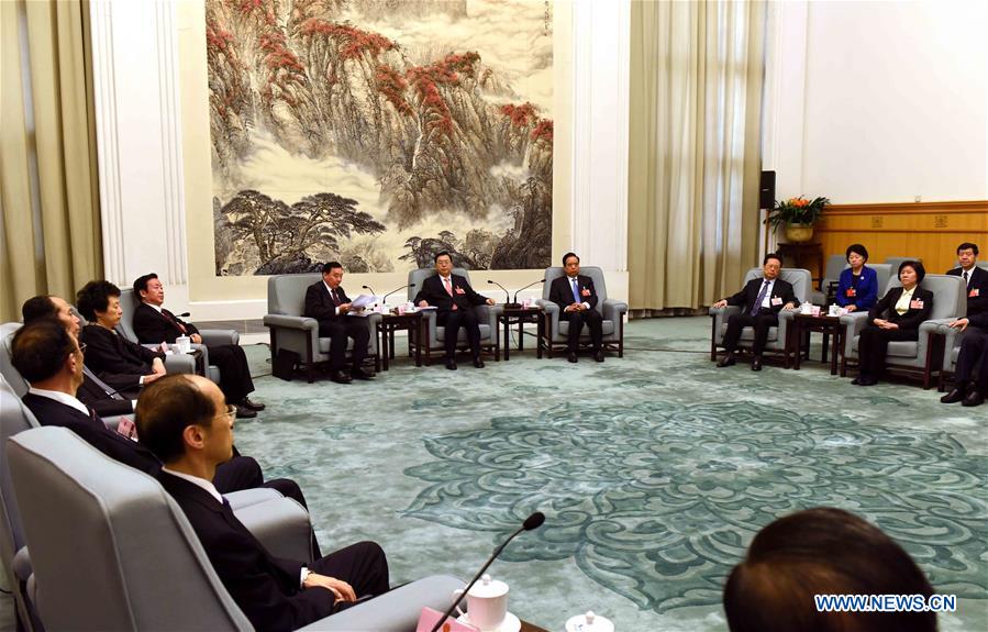 Zhang Dejiang, chairman of the Standing Committee of China's National People's Congress (NPC), presides over the 66th meeting of chairman and vice-chairpersons of the 12th NPC Standing Committee at the Great Hall of the People in Beijing, capital of China, March 4, 2016.