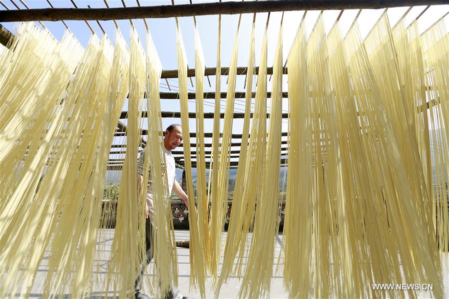 Gufo is famous for the 'Xu noodles,' named after villager Xu Zhonghai for his traditional and special techniques of making the noodles. The techniques were listed in Chongqing's intangible cultural heritage in 2015.