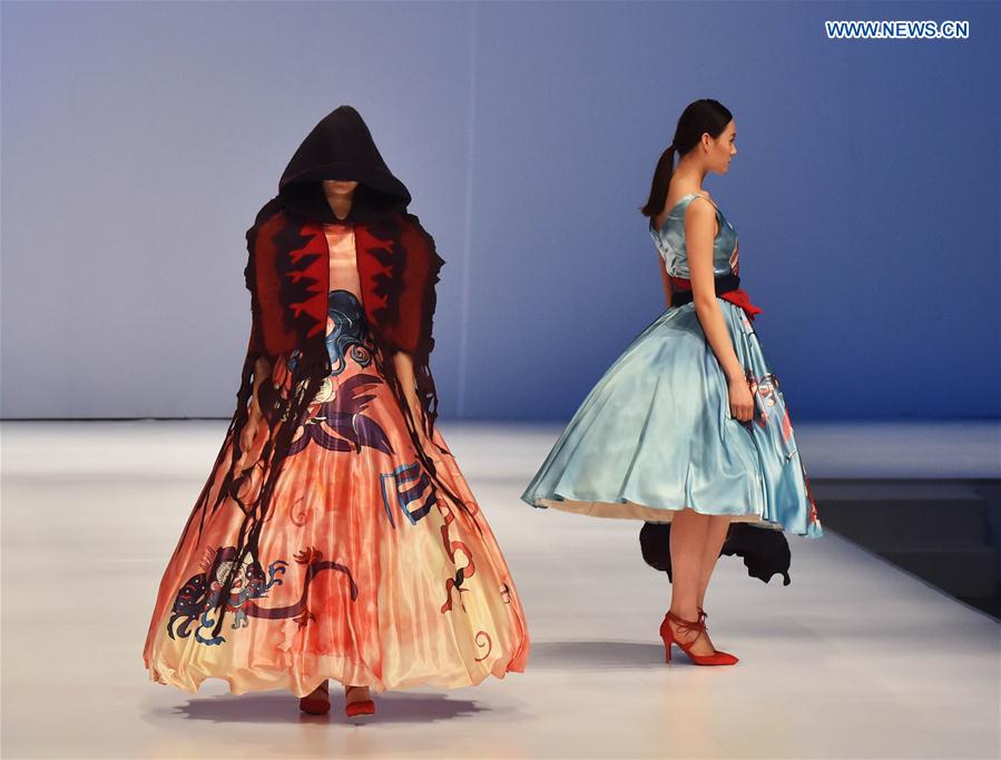 Models present creations at a special show for creative women's fashion in Beijing, capital of China, March 15, 2016. 