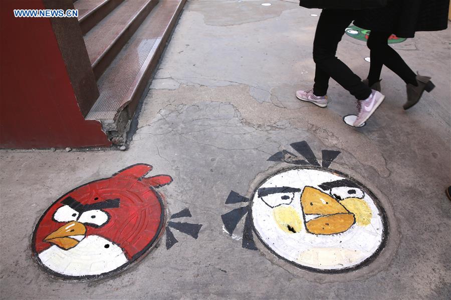 #CHINA-SHANDONG-QUFU-CARTOON MANHOLE COVERS (CN)