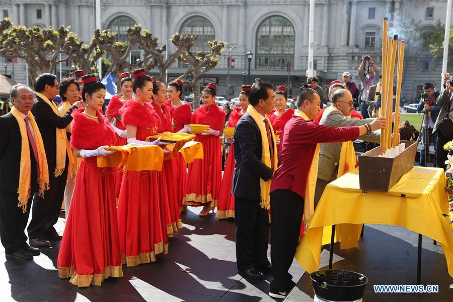 Dancers perform during a ceremony to honor the ancestor of the Chinese nation in San Francisco, the United States, March 27, 2016.