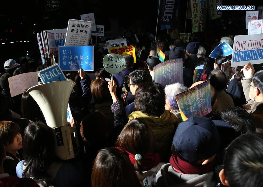 Protesters hold a mass demonstration against the controversial security laws in front of the Diet building in central Tokyo, Japan, March 29, 2016.
