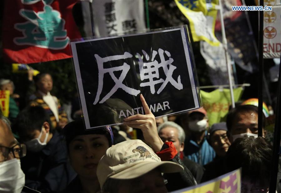Protesters hold a mass demonstration against the controversial security laws in front of the Diet building in central Tokyo, Japan, March 29, 2016.
