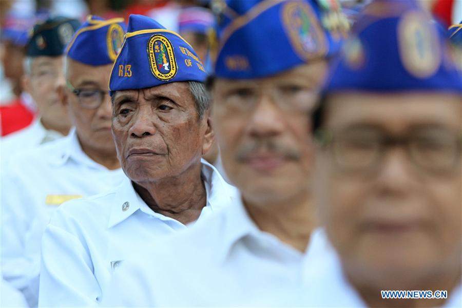 TAGUIG CITY, April 5, 2016 (Xinhua) -- Filipino World War II veterans participate in the ceremony marking the start of the Philippine Veterans Week in Taguig City, the Philippines, April 5, 2016. The Philippine Veterans Week will recognize the remaining 9,500 Filipino World War II veterans, 45 of which will be honored with awards by the Philippine government for their service during the war time. (Xinhua/Rouelle Umali) 