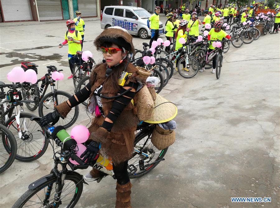 A rider attends the wedding of Zeng Di and Wang Lixia in Chengdu, capital of southwest China's Sichuan Province, April 9, 2016. 