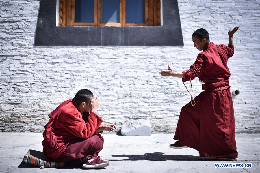 Monks debate on Tibetan Buddhism doctrines at Labu Monastery in Yushu Tibetan Autonomous Prefecture, northwest China's Qinghai Province, April 18, 2016.