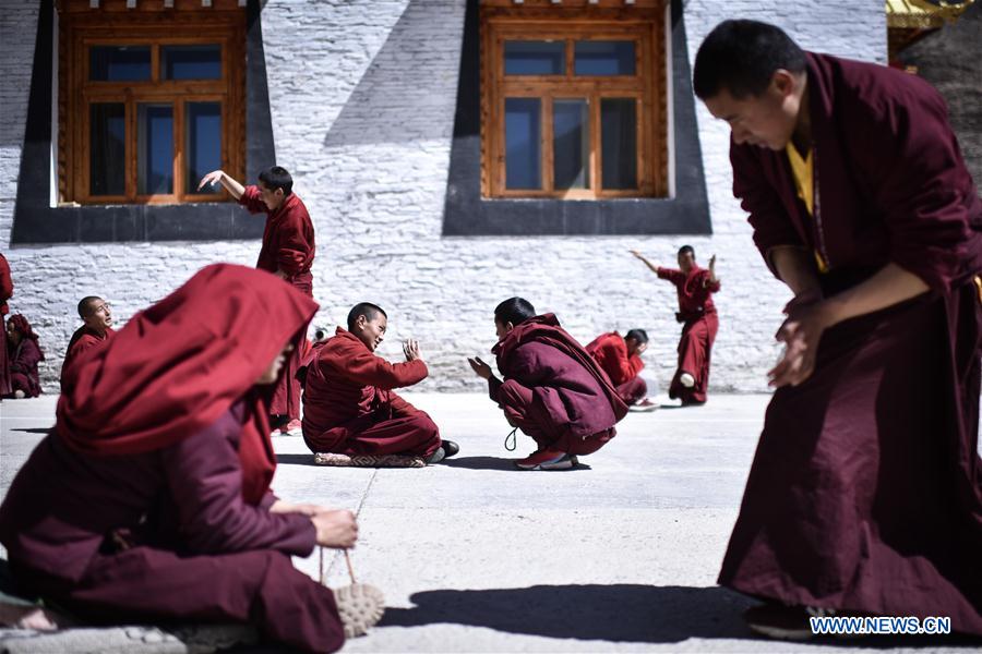 Monks debate on Tibetan Buddhism doctrines at Labu Monastery in Yushu Tibetan Autonomous Prefecture, northwest China's Qinghai Province, April 18, 2016.