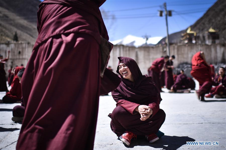 Monks debate on Tibetan Buddhism doctrines at Labu Monastery in Yushu Tibetan Autonomous Prefecture, northwest China's Qinghai Province, April 18, 2016.