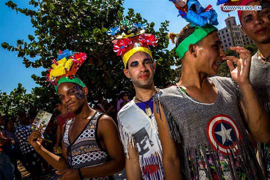 People take part in a march against homophobia, in Havana, capital of Cuba, on May 14, 2016. 