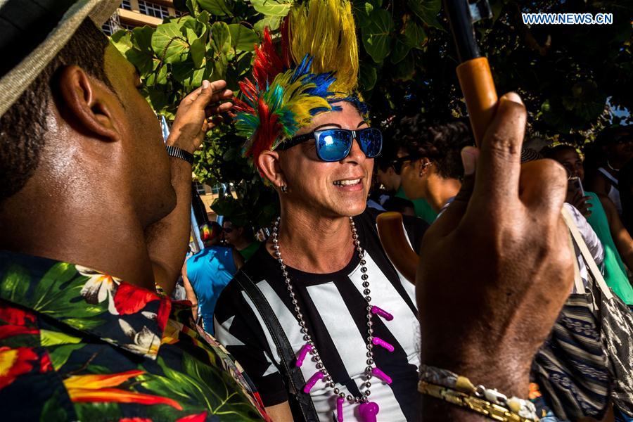 People take part in a march against homophobia, in Havana, capital of Cuba, on May 14, 2016. 