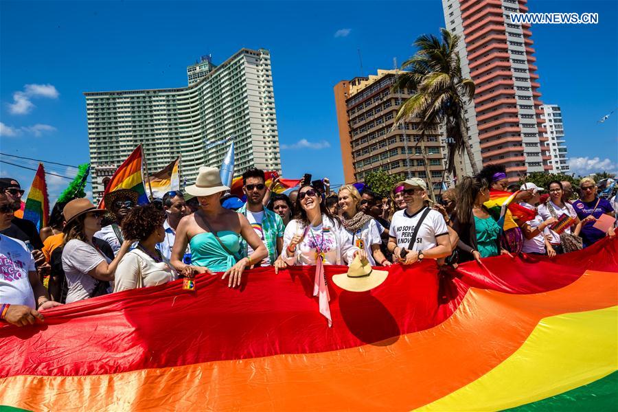 People take part in a march against homophobia, in Havana, capital of Cuba, on May 14, 2016. 