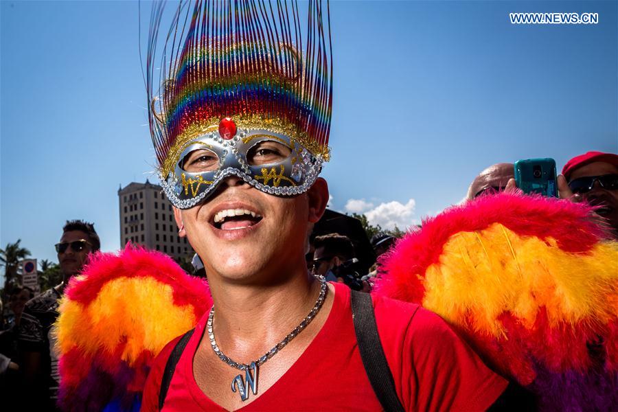 A participant poses during a march against homophobia, in Havana, capital of Cuba, on May 14, 2016.