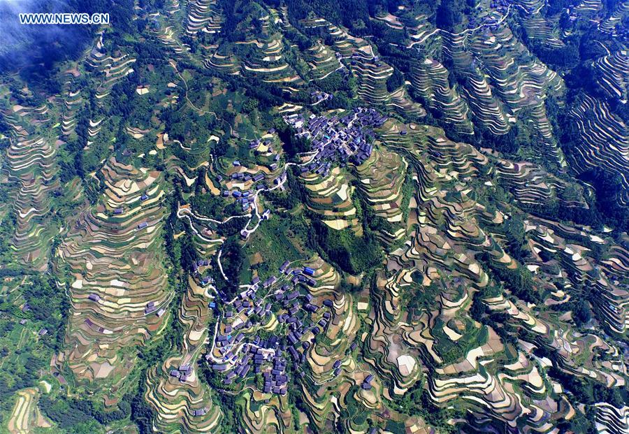 This photo taken with unmanned aerial vehicle on May 10, 2016 shows the Zhiliao Village in Dudong Township of Sanjiang Dong Autonomous County, south China's Guangxi Zhuang Autonomous Region.