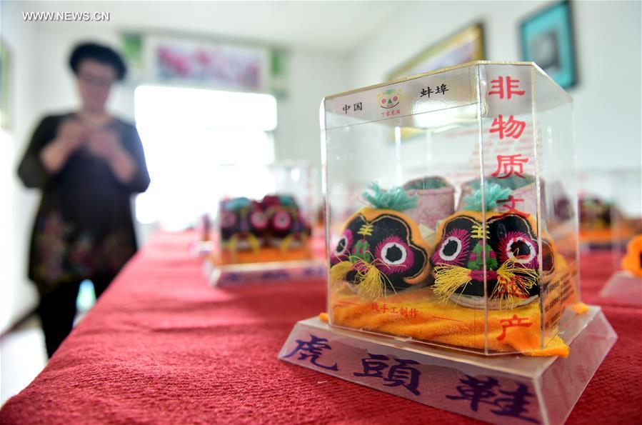 CHINA-ANHUI-BENGBU-TIGER-HEAD SHOES INHERITORS (CN)
