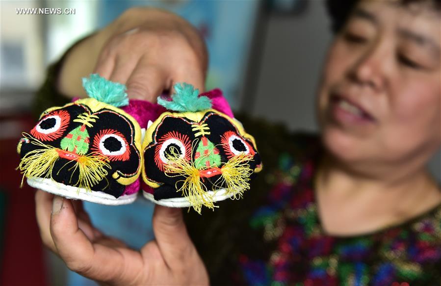CHINA-ANHUI-BENGBU-TIGER-HEAD SHOES INHERITORS (CN)