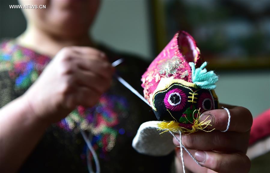 CHINA-ANHUI-BENGBU-TIGER-HEAD SHOES INHERITORS (CN)
