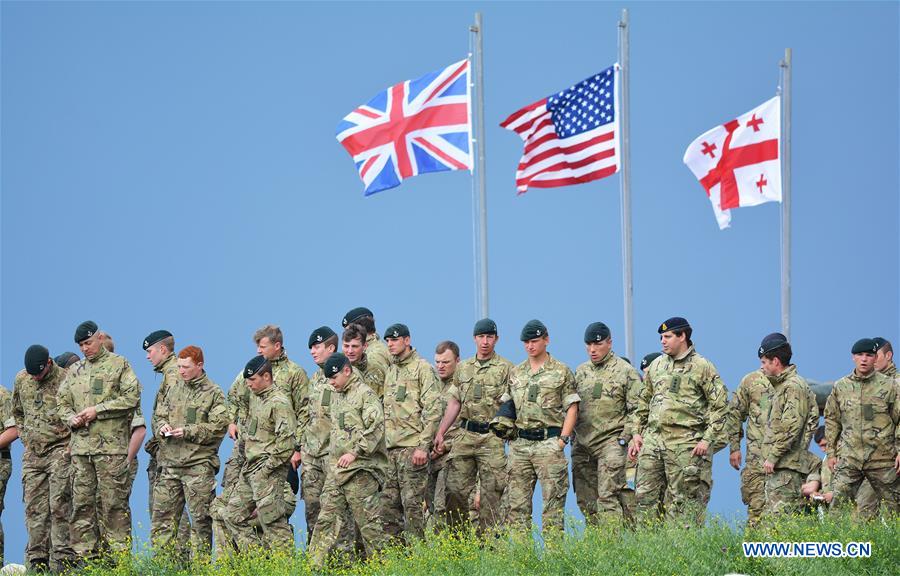 Soldiers are seen on the last day of the live-fire phase of the three-week long joint military drill named 'Noble Partner 2016' at Vaziani base near Tbilisi, Georgia, May 24, 2016.