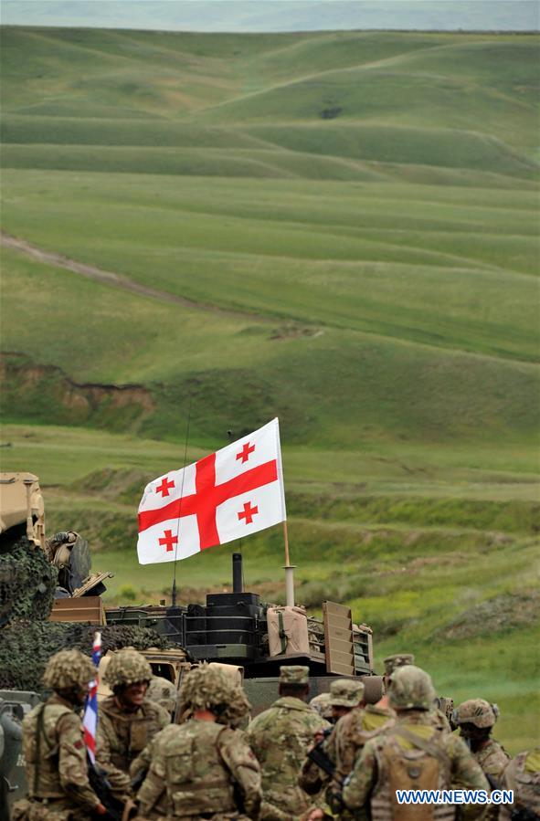 Soldiers are seen on the last day of the live-fire phase of the three-week long joint military drill named 'Noble Partner 2016' at Vaziani base near Tbilisi, Georgia, May 24, 2016.