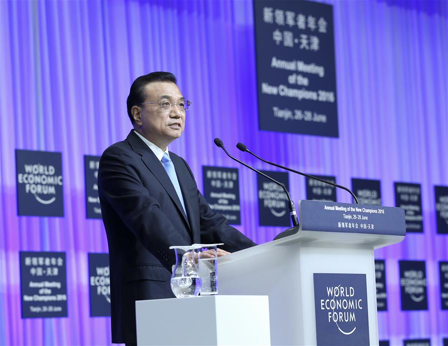 Chinese Premier Li Keqiang addresses the opening ceremony of the Annual Meeting of the New Champions 2016, or Summer Davos Forum, in Tianjin, north China, June 27, 2016.