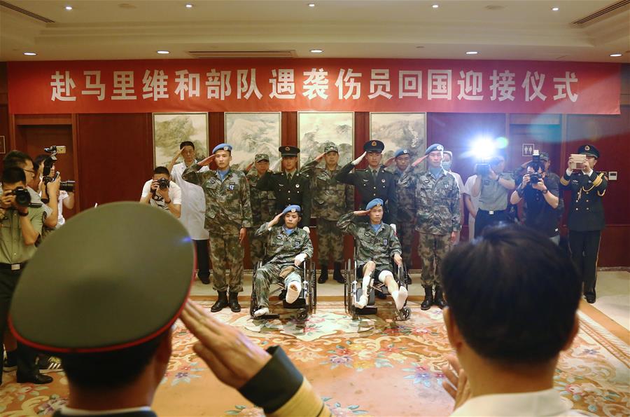 CHINA-BEIJING-MALI-INJURED PEACEKEEPERS-RETURN (CN)