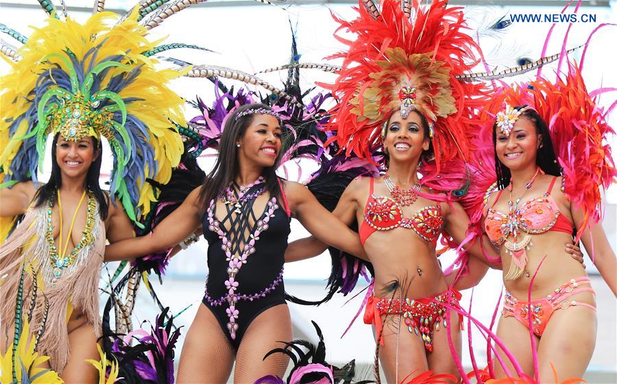 Dressed up revellers perform during the official launch ceremony of the 2016 Toronto Caribbean Carnival at Nathan Philips Square in Toronto, Canada, July 5, 2016. 