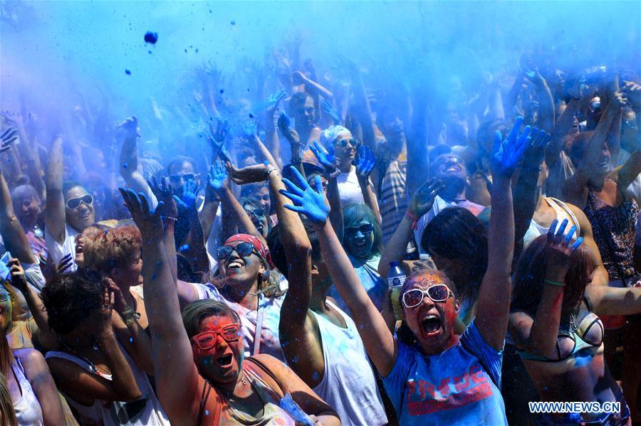 People celebrate the Gay Pride Parade in Barcelona, Spain, July 9, 2016.