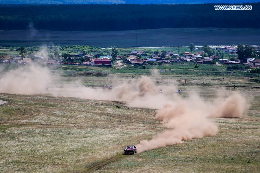 Stephane Peterhansel and Jean Paul Cottret of Team Peugeot Total compete during the third stage of the Moscow-Beijing Silk Road rally 2016 in Ufa, Russia on July 11, 2016. 