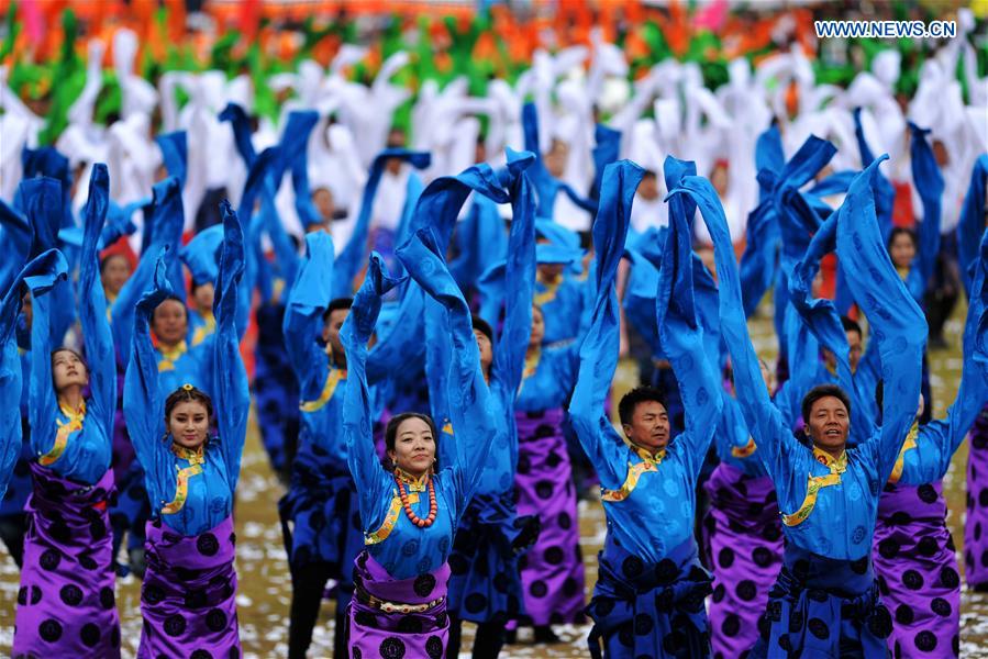 dance at the opening ceremony of Shambhala Tourism Festival in Gannan, northwest China's Gansu Province, July 17, 2016. 
