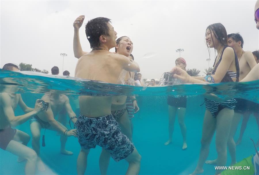 The competition attracted 15 couples kissing for the award. 