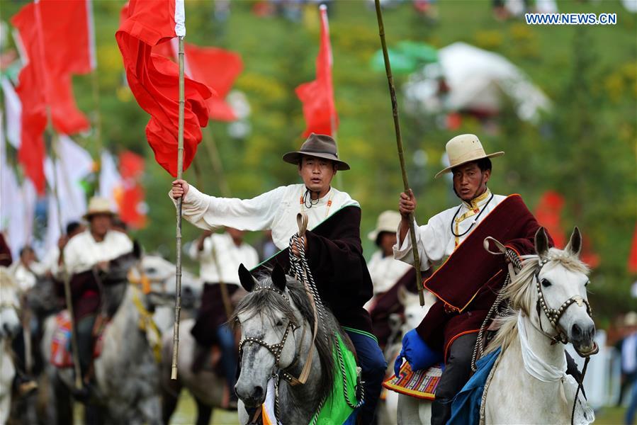 Riders perform at the opening ceremony of Shambhala Tourism Festival in Gannan, northwest China's Gansu Province, July 17, 2016. 