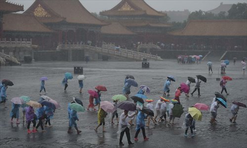 Forbidden City remains free of flooding thanks to sound drainage  system-Xinhua