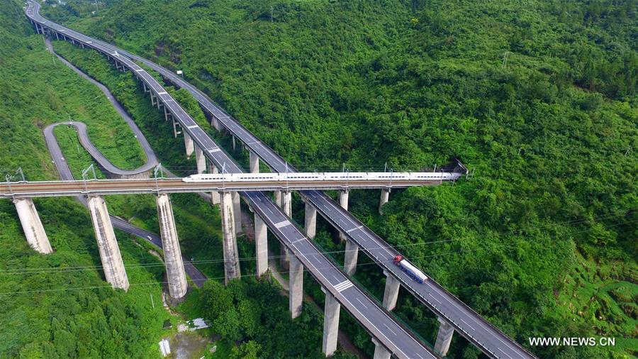 The 377-kilometer-long Yichang-Wanzhou Railroad winds through mountainous areas from its eastern station Yichang in Hubei Province to western station Wanzhou in southwest China's Chongqing.