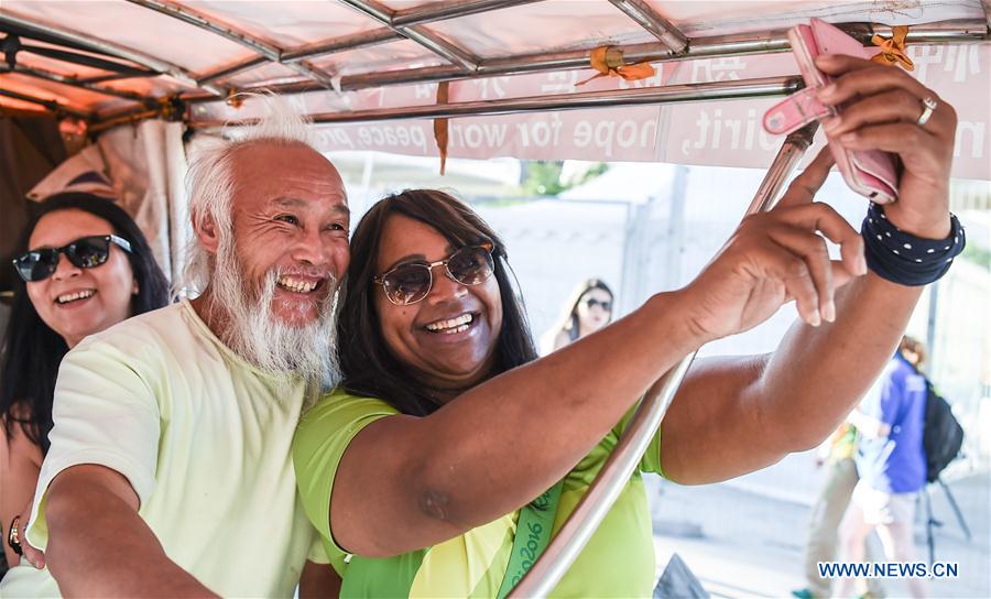 (SP)BRAZIL-RIO DE JANEIRO-OLYMPICS-CHINESE FAMER-RICKSHAW RIDE