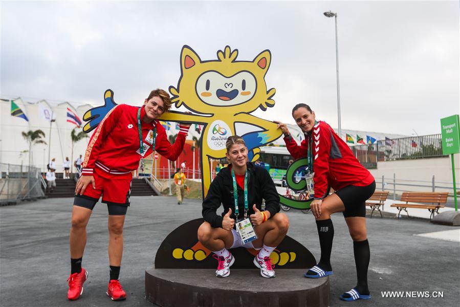 Members of the delegation of Montenegro take a photo at the Olympic village in Rio de Janeiro, Brazil, on Aug. 2, 2016.
