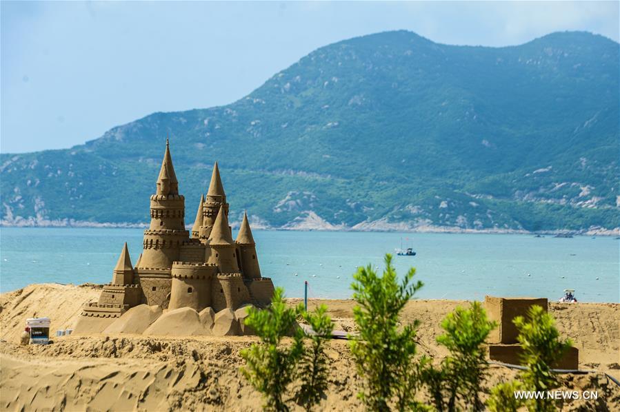 The sand sculptures here are expected to open to the public on Sept. 9. 
