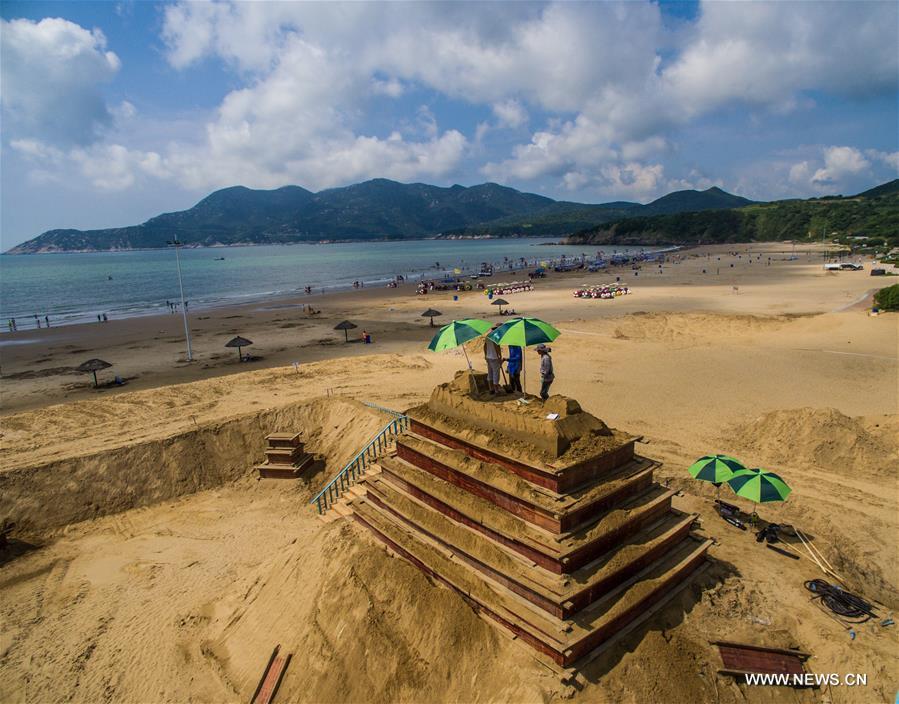 The sand sculptures here are expected to open to the public on Sept. 9. 