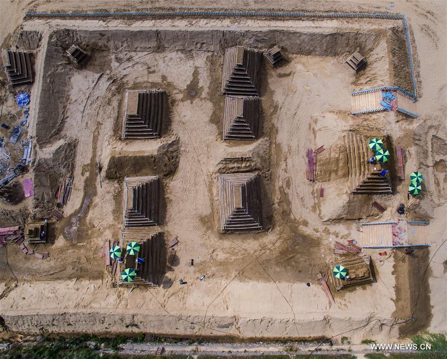 The sand sculptures here are expected to open to the public on Sept. 9. 