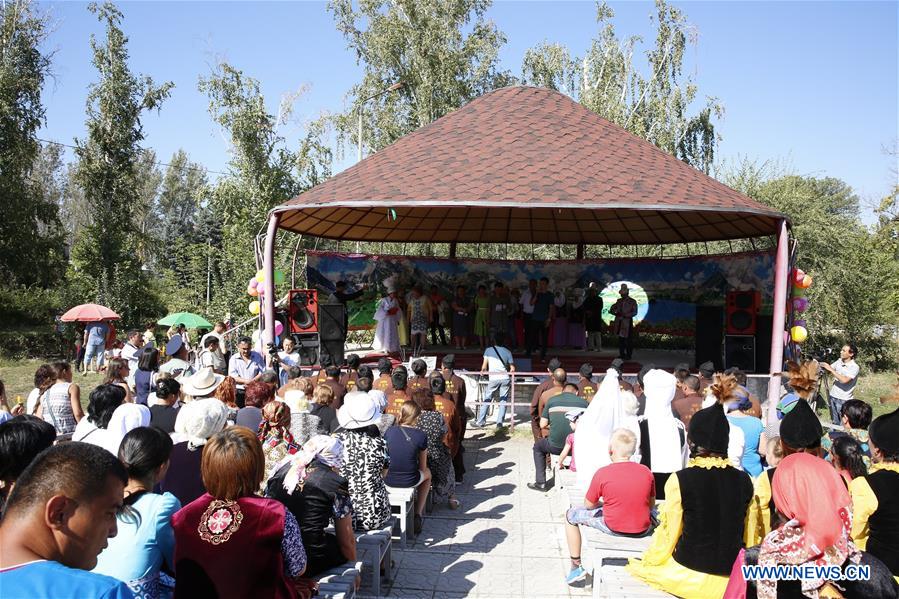 A group of Chinese caravan with 54 camels, 10 horses, 15 vehicles and more than 50 people entered Kyrgyzstan on Aug. 22 to continue their Silk Road culture tour. (Xinhua/Roman Gainanov) 